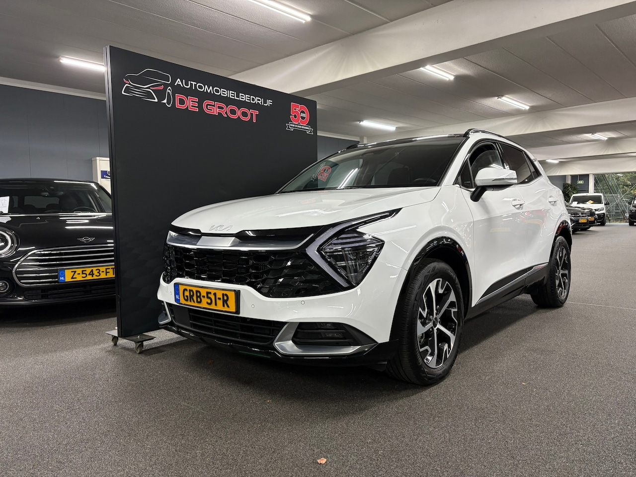 Kia Sportage - 1.6 T-GDi Hybrid DynamicPlusLine/ NL auto/ Eerste eigenaar/ Parkeersensoren - AutoWereld.nl