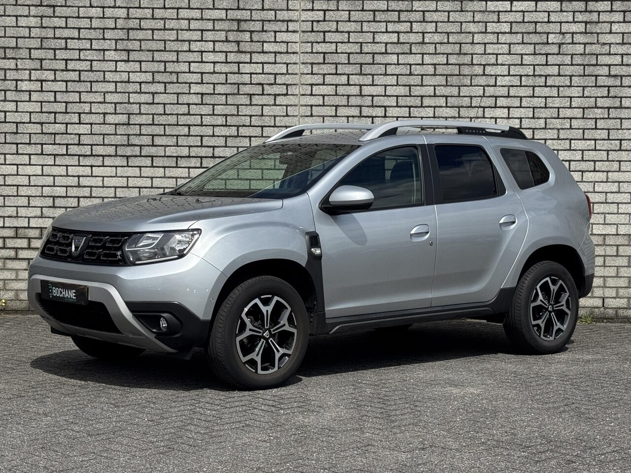 Dacia Duster - 1.0 TCe Prestige | Achteruitrijcamera | Navigatie | Climate Control | Bluetooth | - AutoWereld.nl