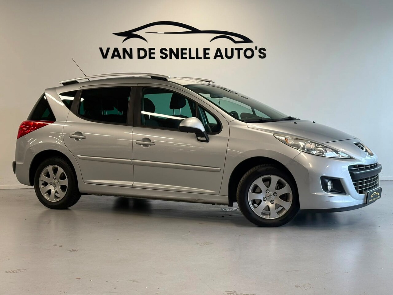Peugeot 207 SW - 1.6 VTi Sportium AIRCO/PDC/CRUISE/TREKHAAK - AutoWereld.nl