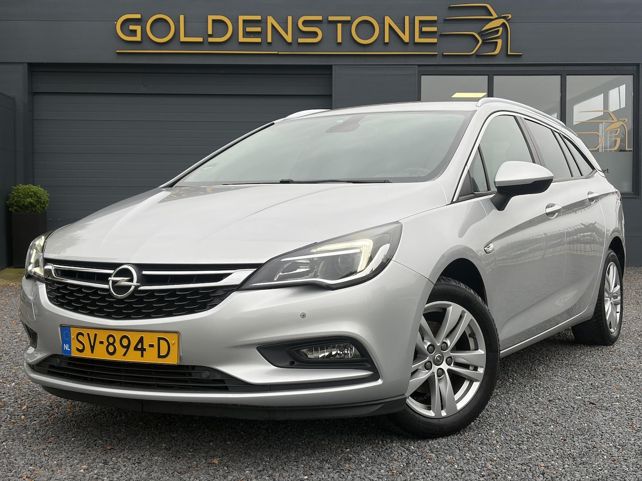 Opel Astra Sports Tourer - 1.4 Online Edition ✓2e Eigenaar✓Trekhaak✓Carplay✓Navi✓Recent beurt gehad✓150pk✓Keyless✓6 B - AutoWereld.nl