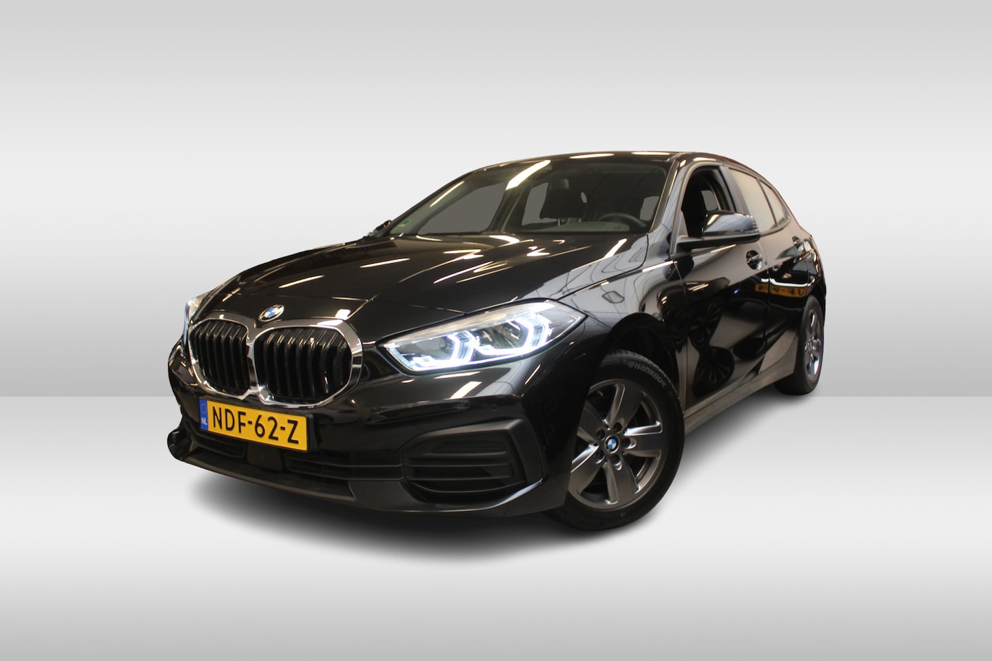BMW 1-serie - 118i l Cruise Control l PDC l Navi l DAB l Apple Carplay/ Android Auto l Alarm - AutoWereld.nl