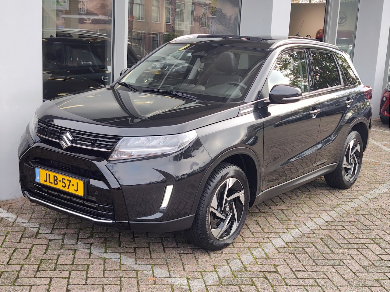 Suzuki Vitara - 1.4 BOOSTERJET STYLE SMART HYBRID Dodehoekdetectie | Navi | Keyless | Alcantara - AutoWereld.nl