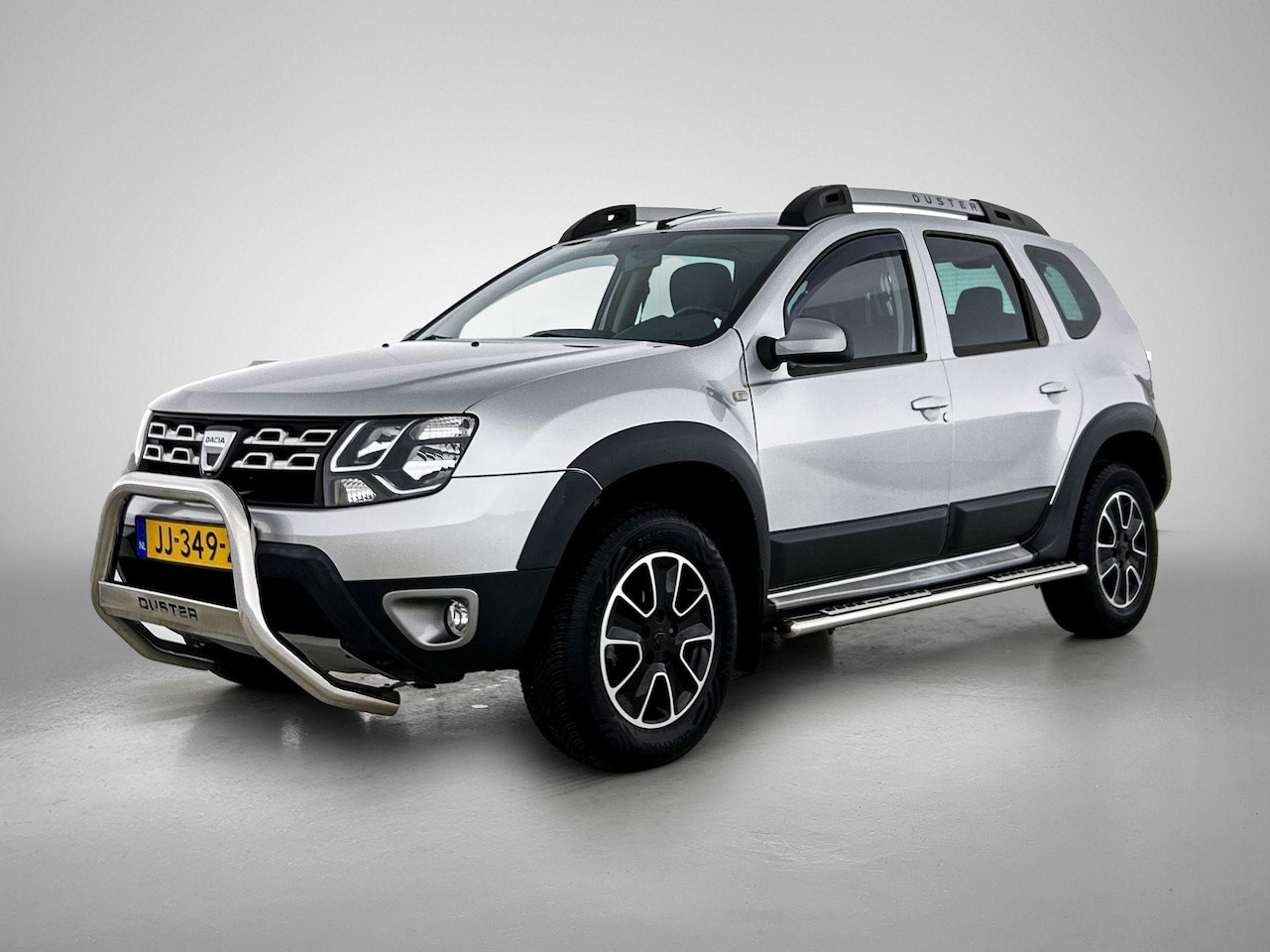 Dacia Duster - 1.2 TCe 4x2 Prestige | TREKHAAK | AIRCO | LEDER | ACHTERUITRIJCAMERA | NAVIGATIE | CRUISE - AutoWereld.nl