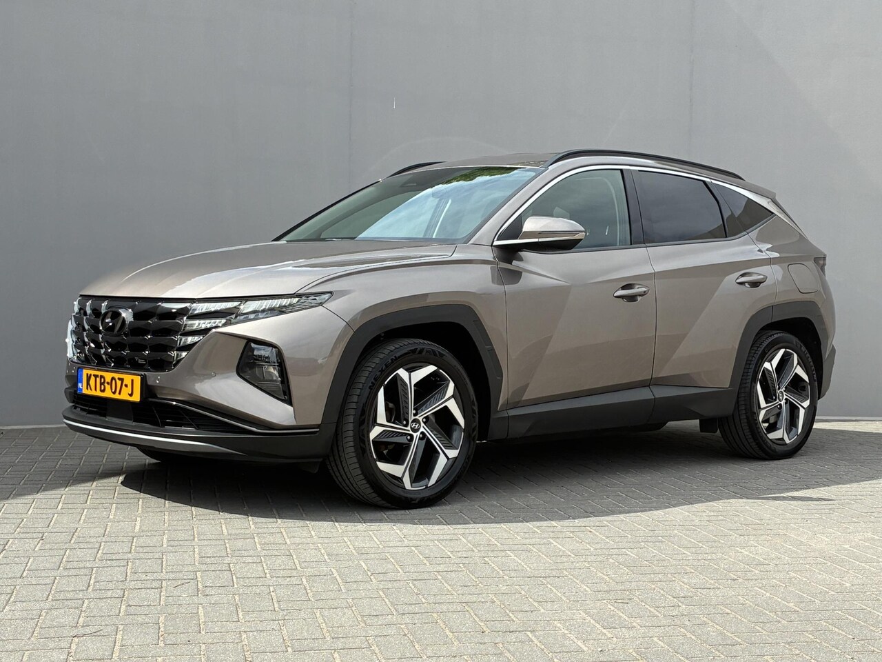 Hyundai Tucson - 1.6 T-GDI PHEV Comfort Smart 4WD / Adaptief Cruise Control / SOH 99% / Navigatie / Achteru - AutoWereld.nl