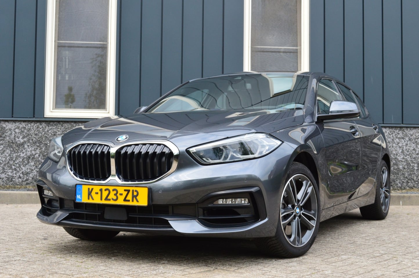 BMW 1-serie - 120i Sport-Line High Executive Rijklaarprijs-Garantie Navigatie Led Sport interieur Airco - AutoWereld.nl