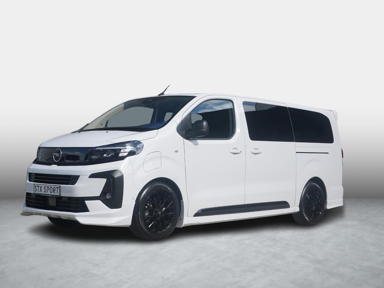 Opel Vivaro-e - Dubbele Cabine 75kWh | STX Sport | Mooiste  bus van NL (!) | Lederen bekleding | Spoilerpa - AutoWereld.nl