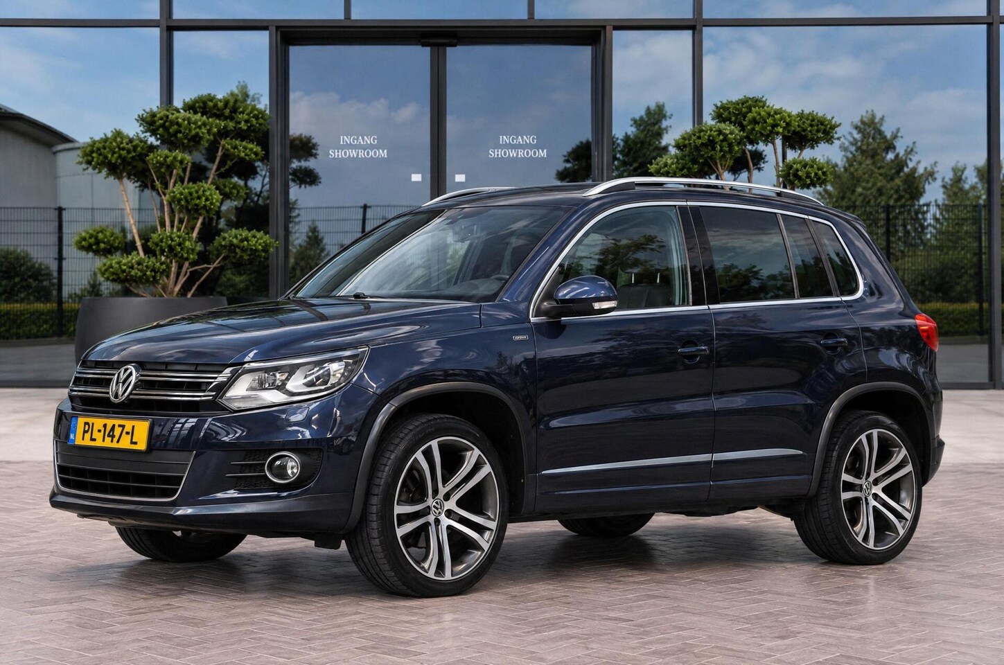 Volkswagen Tiguan - 1.4 TSI R-Line Edition | PANO | CRUISE - AutoWereld.nl