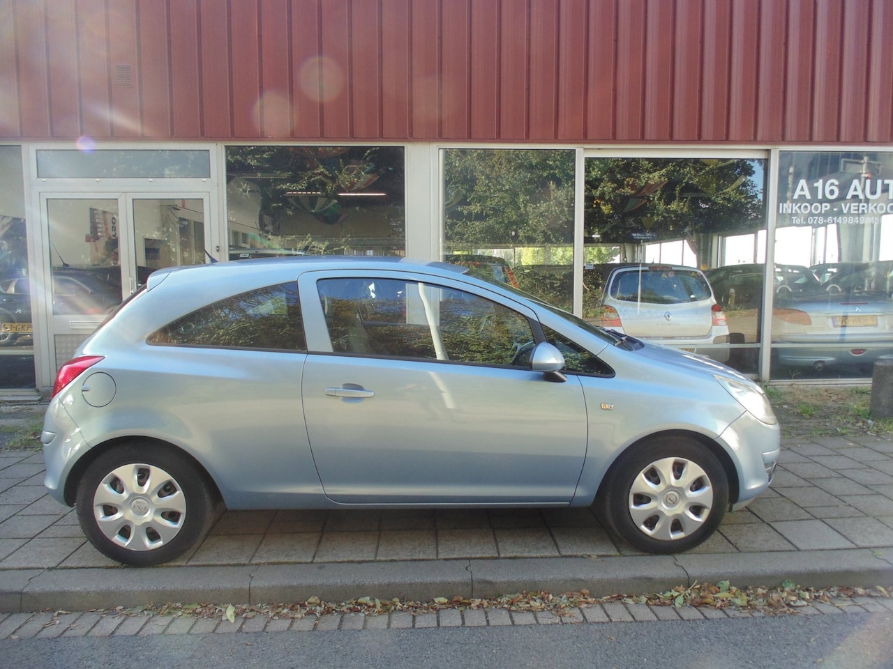 Opel Corsa - 1.2-16V Business MET AIRCO 2009APK 10-2027 - AutoWereld.nl