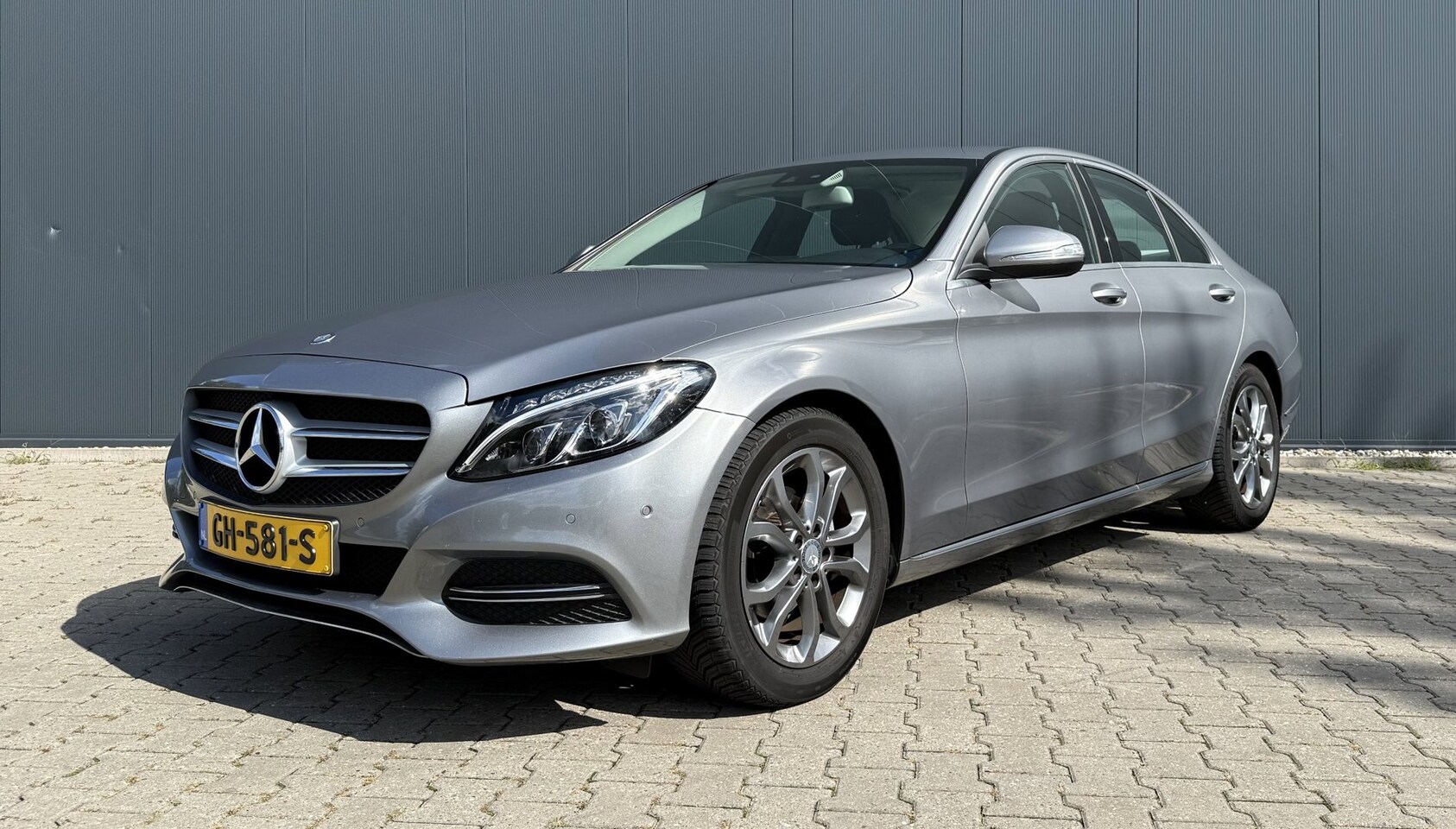 Mercedes-Benz C-klasse - 180 Ambition Automaat Airco Navi Nap Trekhaak - AutoWereld.nl