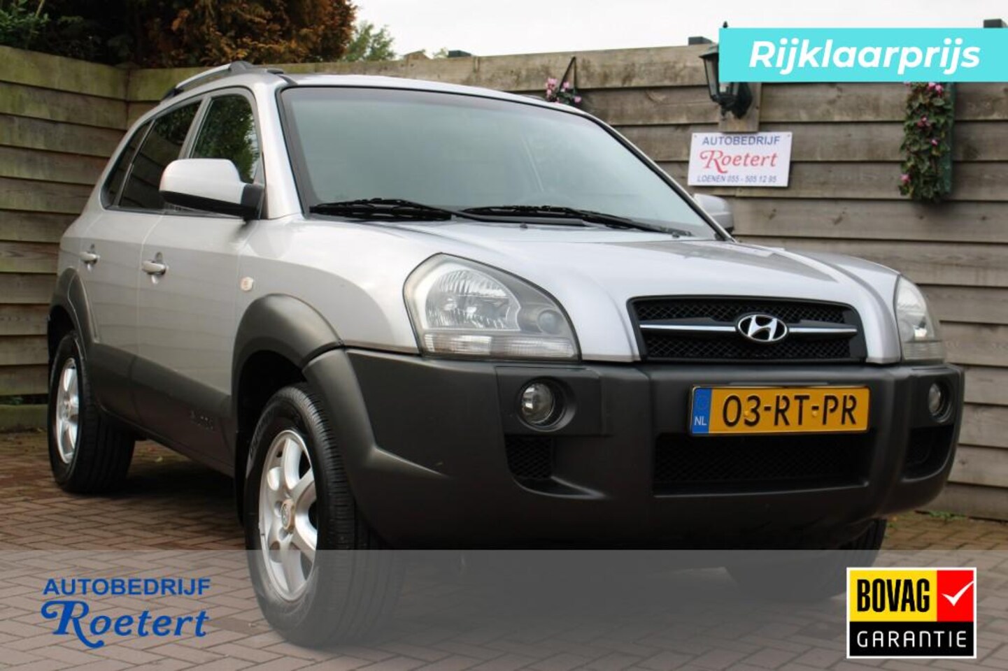Hyundai Tucson - 2.0i 141pk Dynamic airco/cruise/bluetooth/trekhaak/LMvelgen - AutoWereld.nl