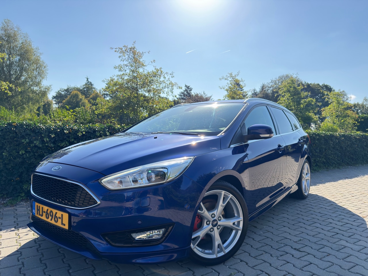 Ford Focus Wagon - 1.0 Titanium Edition 1.0 Titanium Edition , ST LIne , Full Options , Clima / Cruise / Half-Leder / Stuur + Stoe - AutoWereld.nl