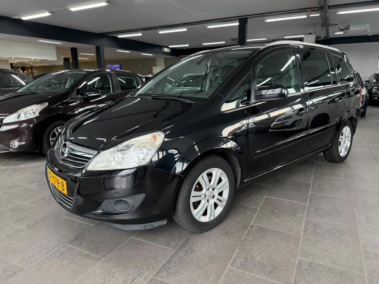 Opel Zafira - 1.8 Cosmo automaat 7-prs half leer navigatie clima cruise controle lm-velgen parkeersensor - AutoWereld.nl