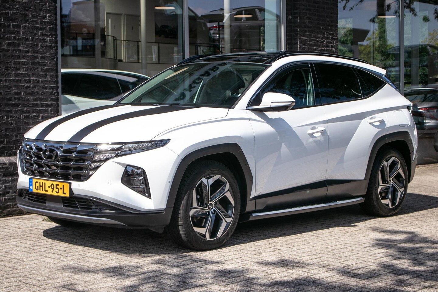 Hyundai Tucson - 1.6 T-GDI PHEV Premium Sky 4WD | Panorama | Leder | All Season banden | - AutoWereld.nl