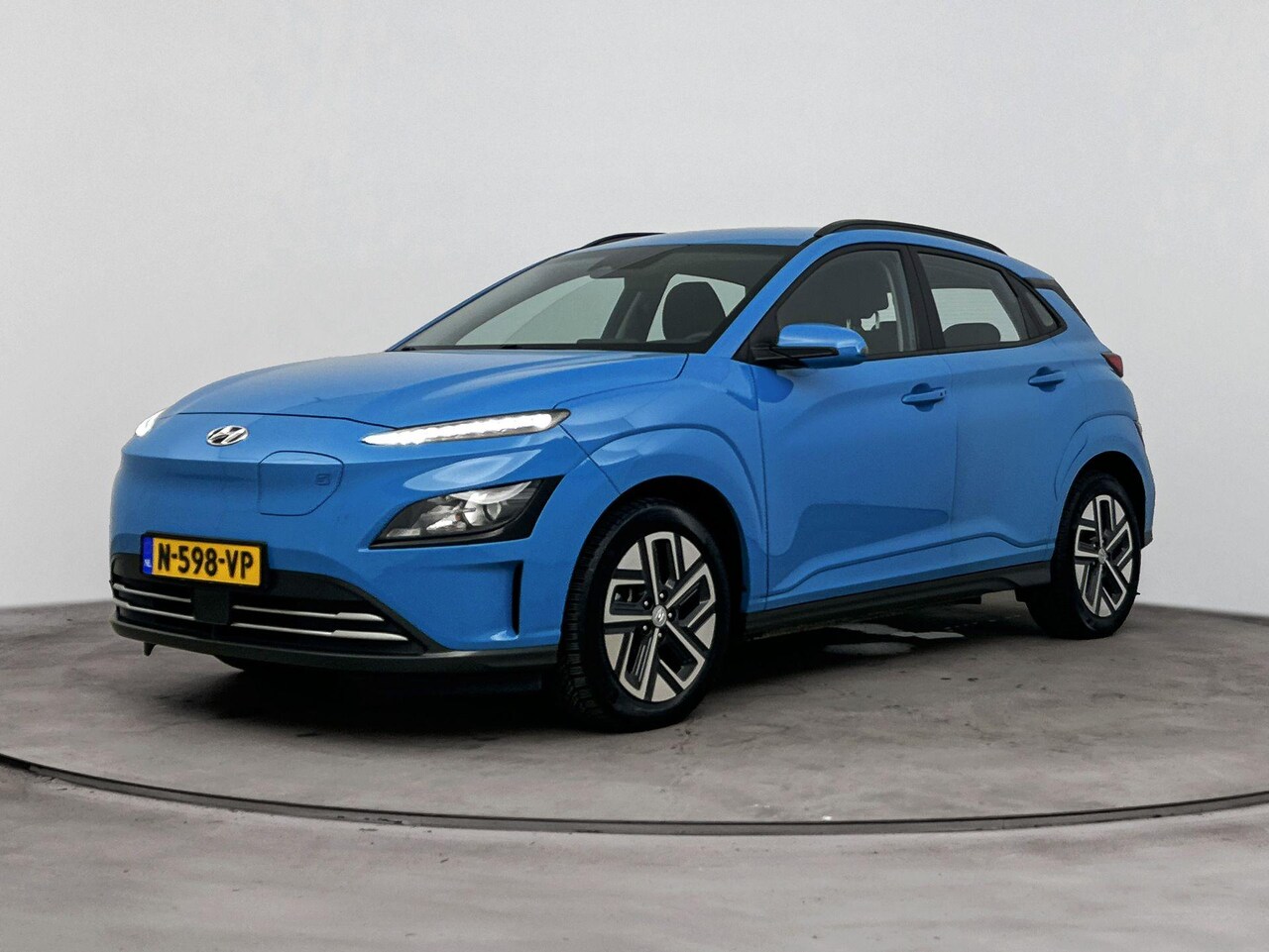 Hyundai Kona Electric - EV Comfort 64 kWh | Navigatie & Carplay | Camera | Premium Audio | Soh 95,7% | - AutoWereld.nl