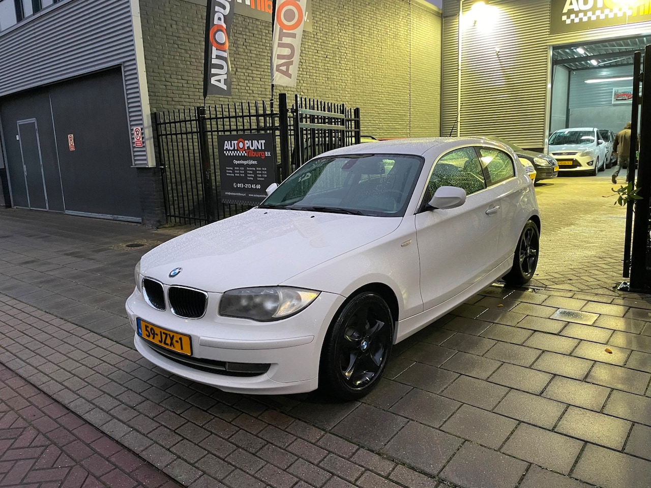BMW 1-serie - 118i Business Line Sport Airco Navi NAP APK - AutoWereld.nl