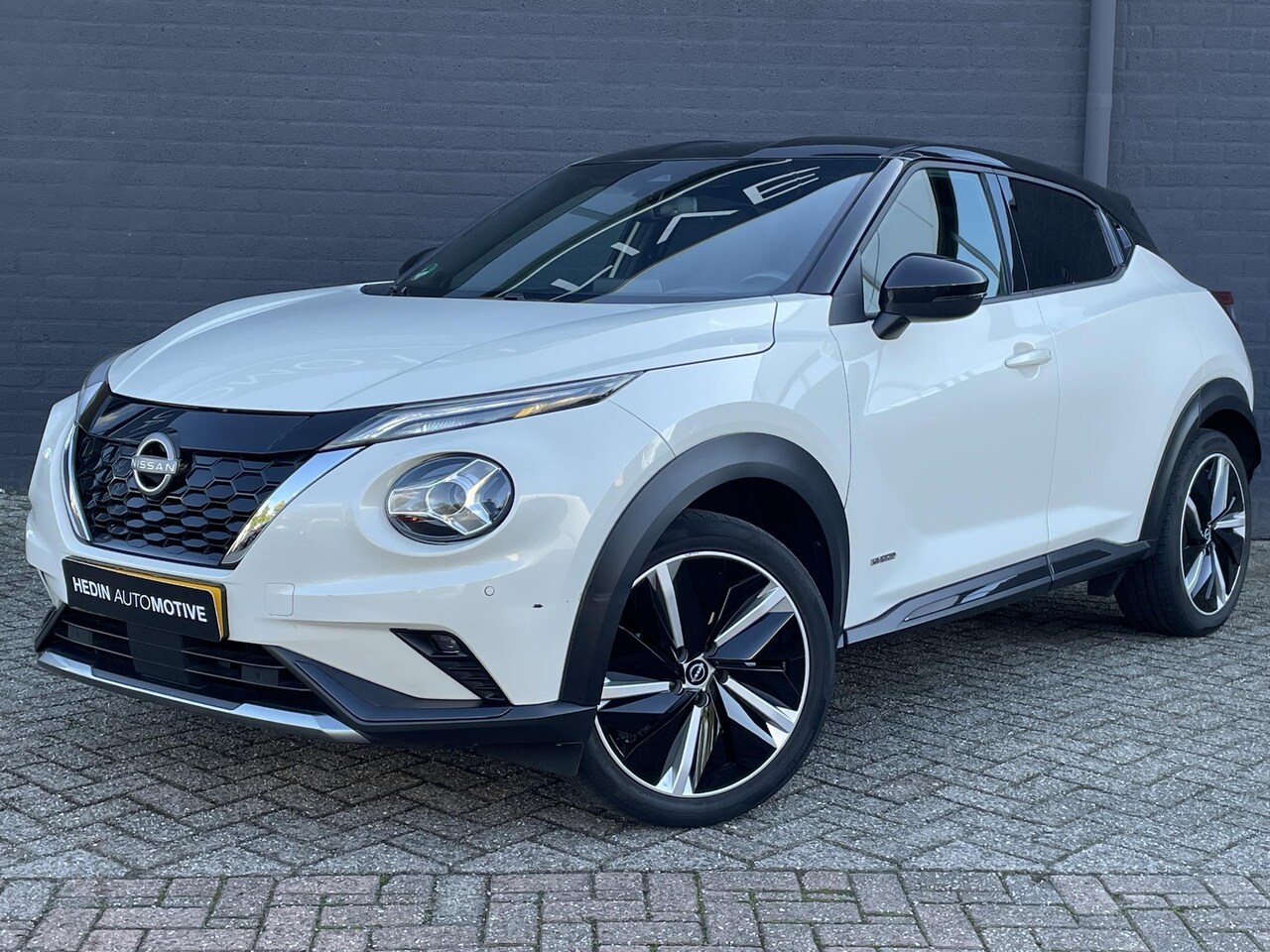 Nissan Juke - 1.6 Hybrid N-Design | Navigatie | Camera | Climate Control - AutoWereld.nl