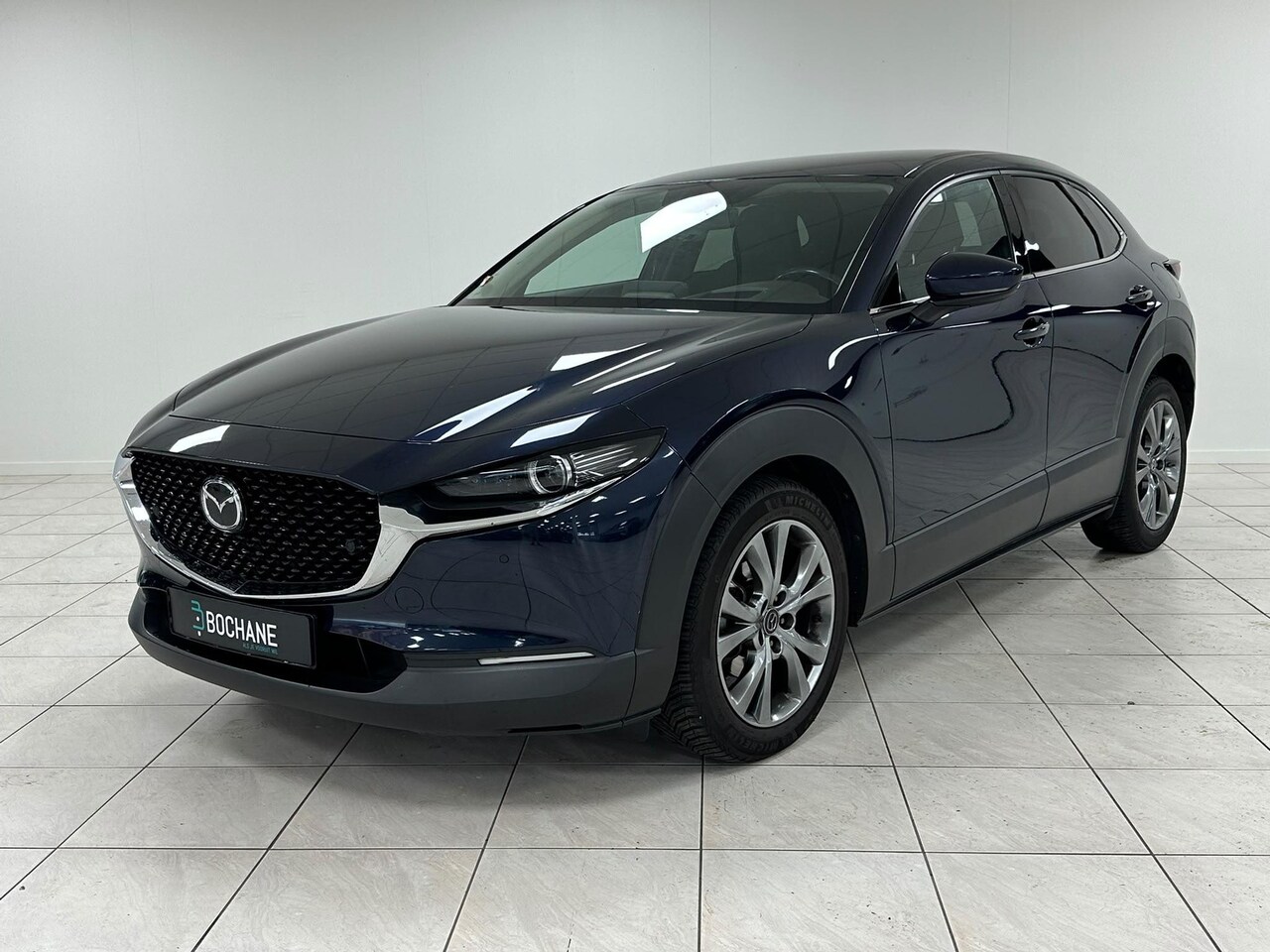 Mazda CX-30 - 2.0 e-SkyActiv-X M Hybrid Luxury TREKHAAK | NAVIGATIE | ACHTERUITRIJCAMERA - AutoWereld.nl