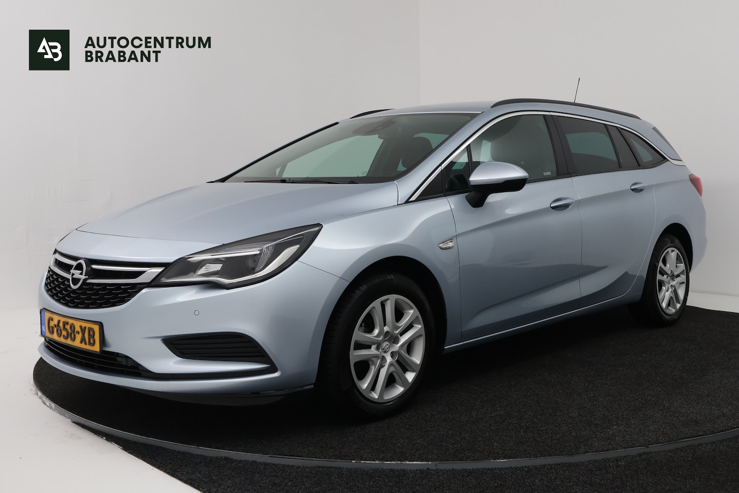 Opel Astra Sports Tourer - 1.0 Innovation (TREKHAAK, STUUR/STOEL VERWARMING, CRUISE ADAPTIEF) - AutoWereld.nl