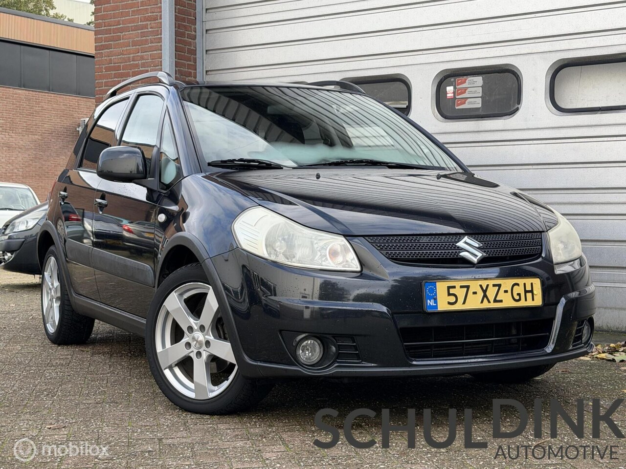Suzuki SX4 - 1.6 Shogun AIRCO|TREKHAAK|ELEKTRISCHE RAMEN - AutoWereld.nl