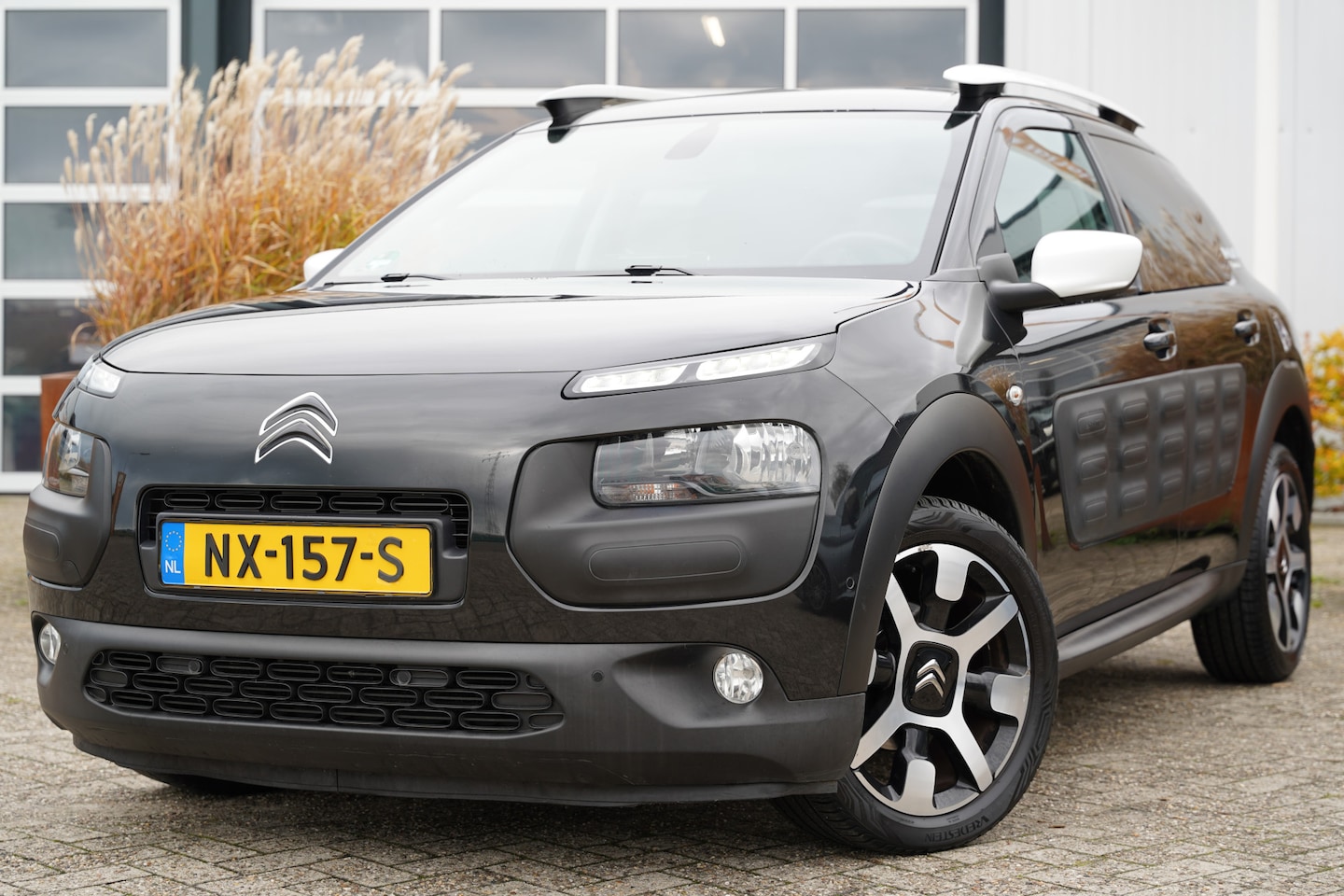 Citroën C4 Cactus - 1.2 PureTech Rip Curl 110pk | Achteruitrijcamera | Bluetooth | Cruise control | Lederen/st - AutoWereld.nl