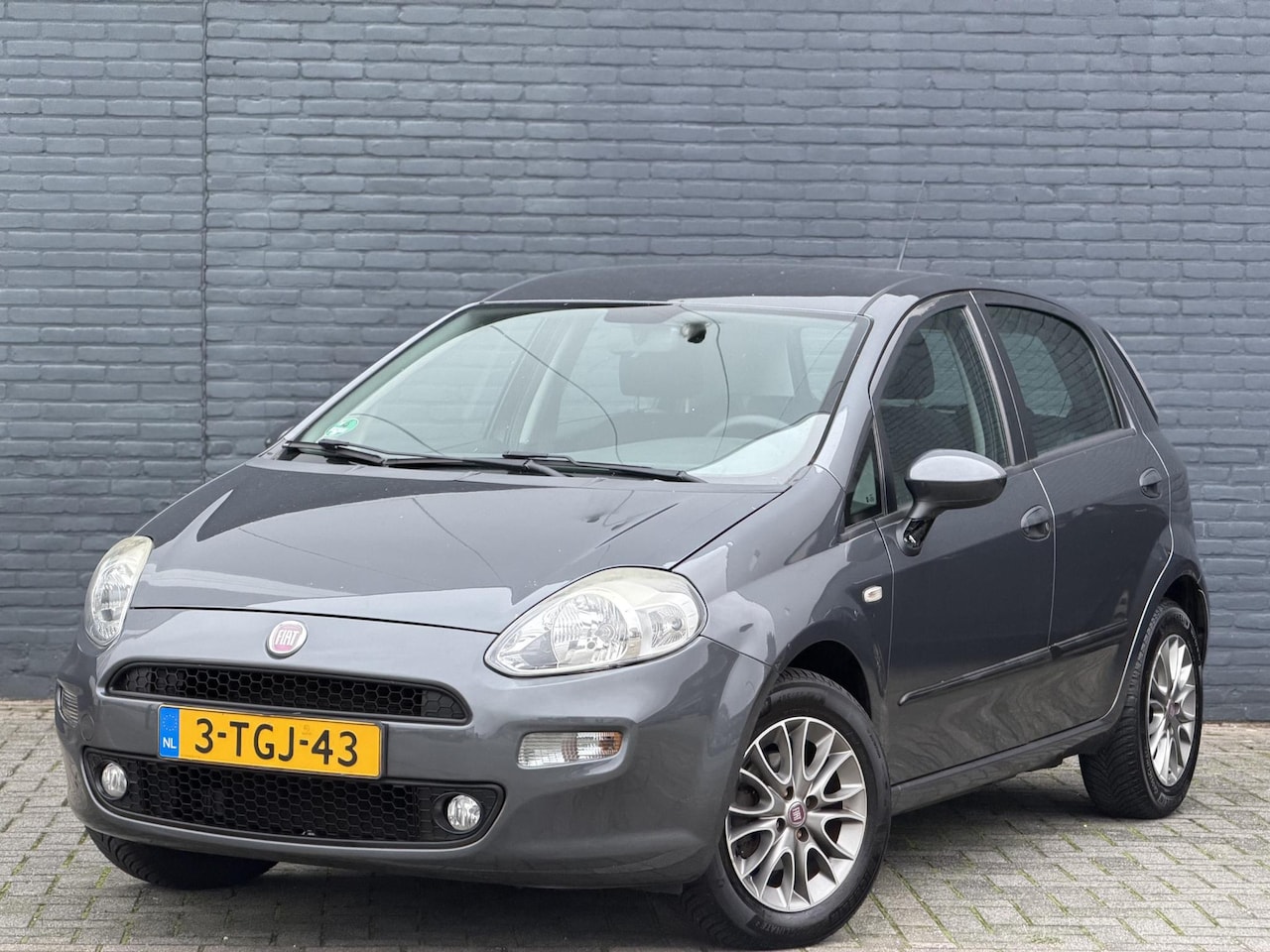 Fiat Punto Evo - 1.2 Pop * D.riem gedaan* Airco l 5 deurs - AutoWereld.nl