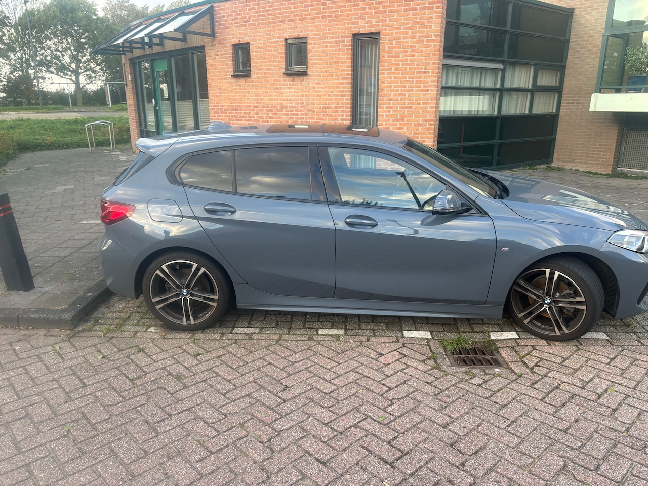 BMW 1-serie - 118i Executive M line sport - AutoWereld.nl