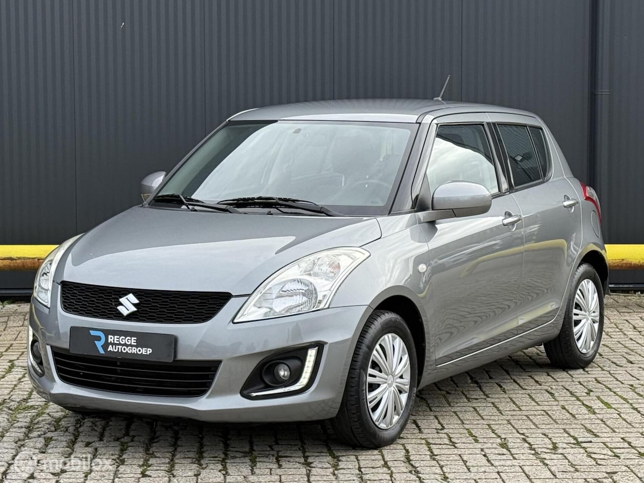 Suzuki Swift - 1.2 Style EASSS AIRCO | CRUISE CONTROL - AutoWereld.nl