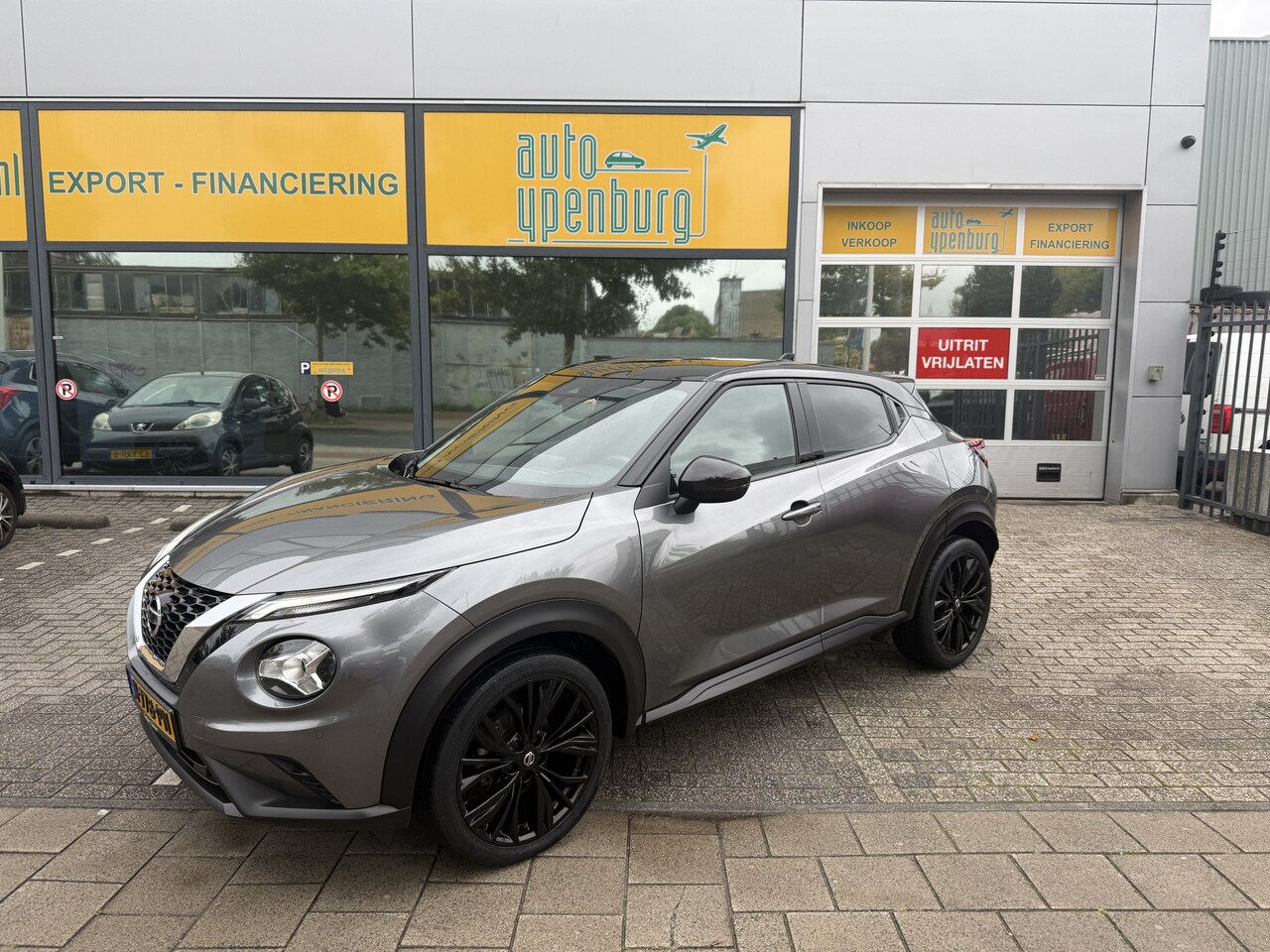 Nissan Juke - 1.0 DIG-T Enigma * 39.393 Km * Camera * Apple Carplay * Climatronic * - AutoWereld.nl