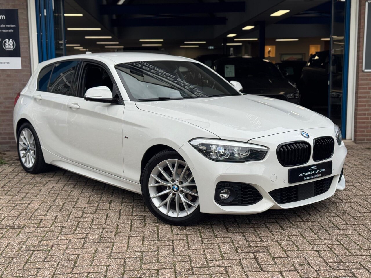 BMW 1-serie - 118i M-Pakket 2019 WIT AUT NAVI CAMERA ACC NAP! - AutoWereld.nl