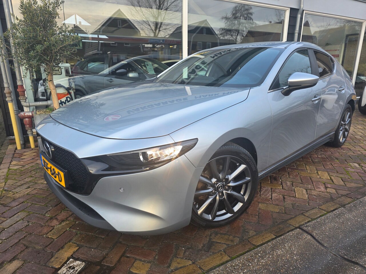 Mazda 3 - 2.0 e-SkyActiv-G M Hybrid 122 Luxury,mooie uitstraling - AutoWereld.nl