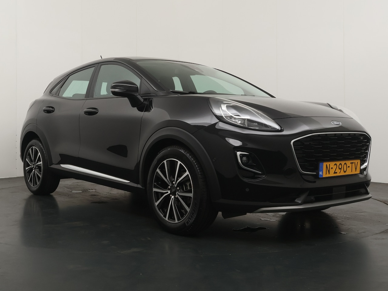 Ford Puma - 1.0 EcoB. Hybrid Mild Titanium Automaat / Navi / Clima / Parkeersensoren / Cruise - AutoWereld.nl