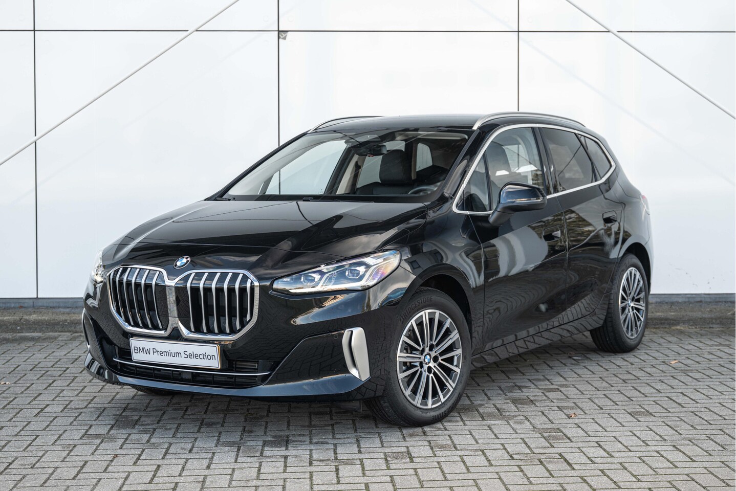 BMW 2-serie Active Tourer - 218i Luxury Line Automaat / Sportstoelen / Comfort Access / Achteruitrijcamera / Adaptieve - AutoWereld.nl