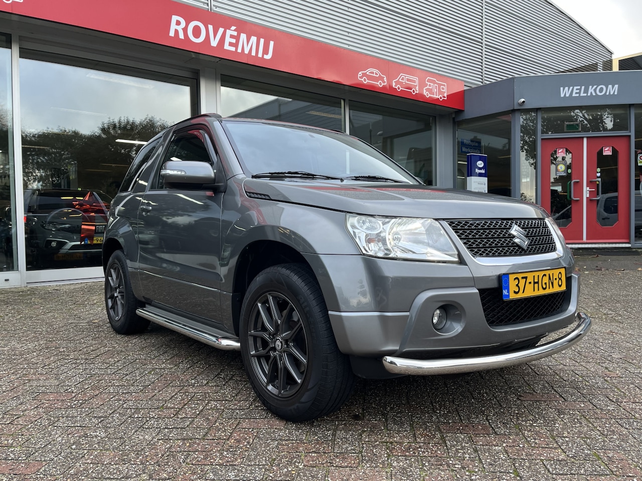 Suzuki Grand Vitara - 2.4 Exclusive Clima, Stoelverwarming, Side bars. - AutoWereld.nl