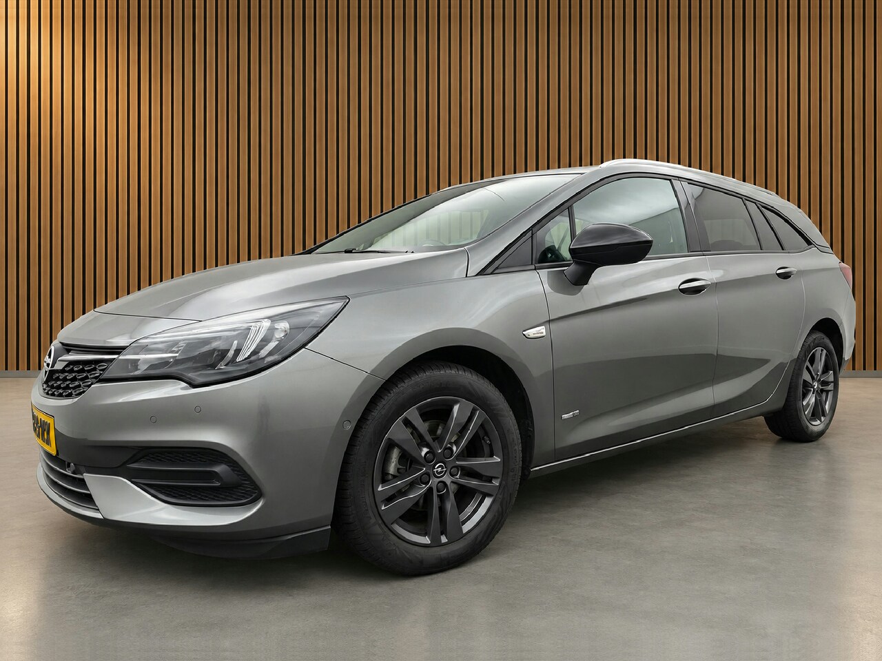 Opel Astra Sports Tourer - 1.2T 110pk Design & Tech, Camera | Navi & Carplay - AutoWereld.nl
