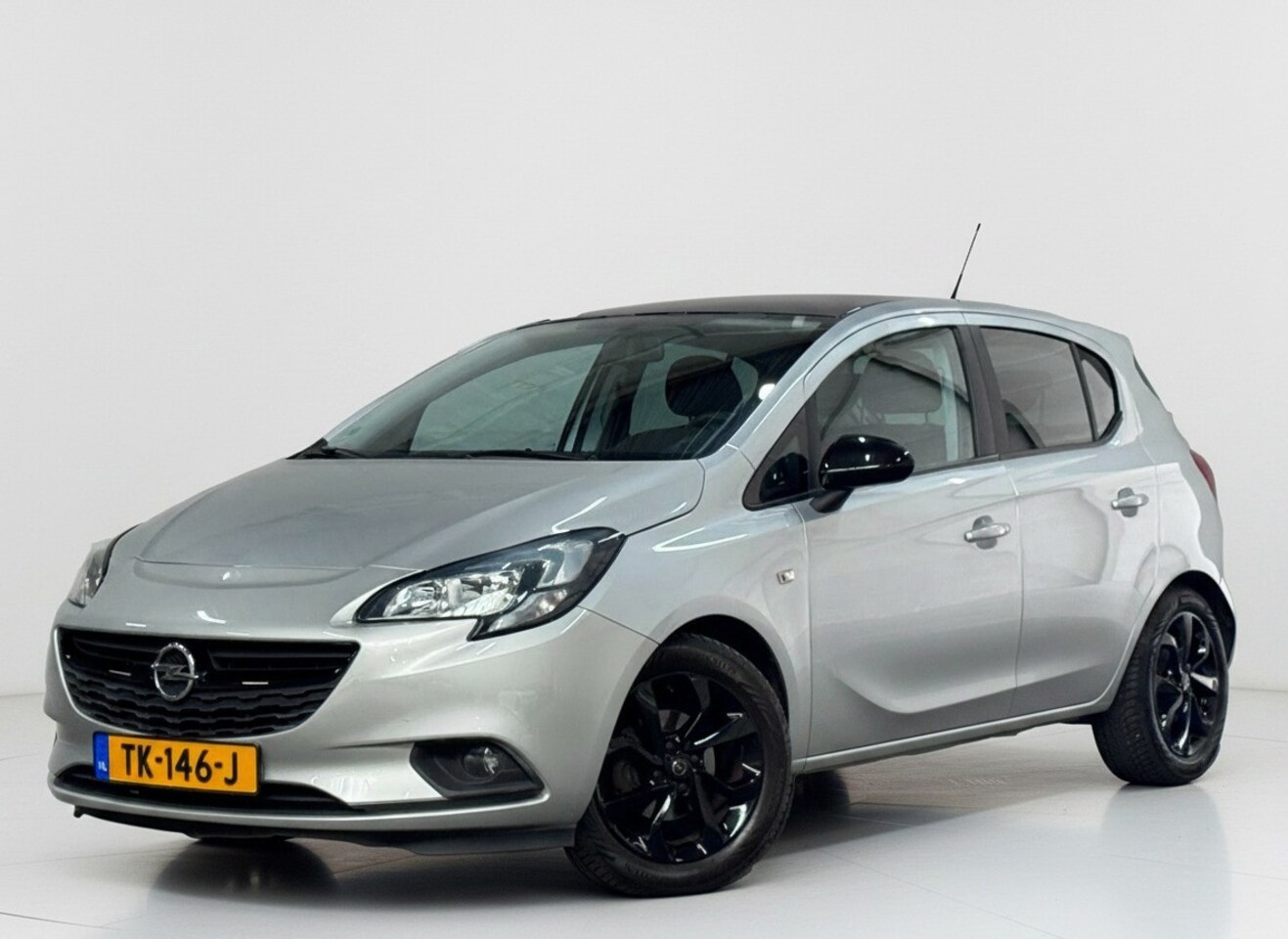 Opel Corsa - 1.4 Edition Automaat Cruise Airco - AutoWereld.nl