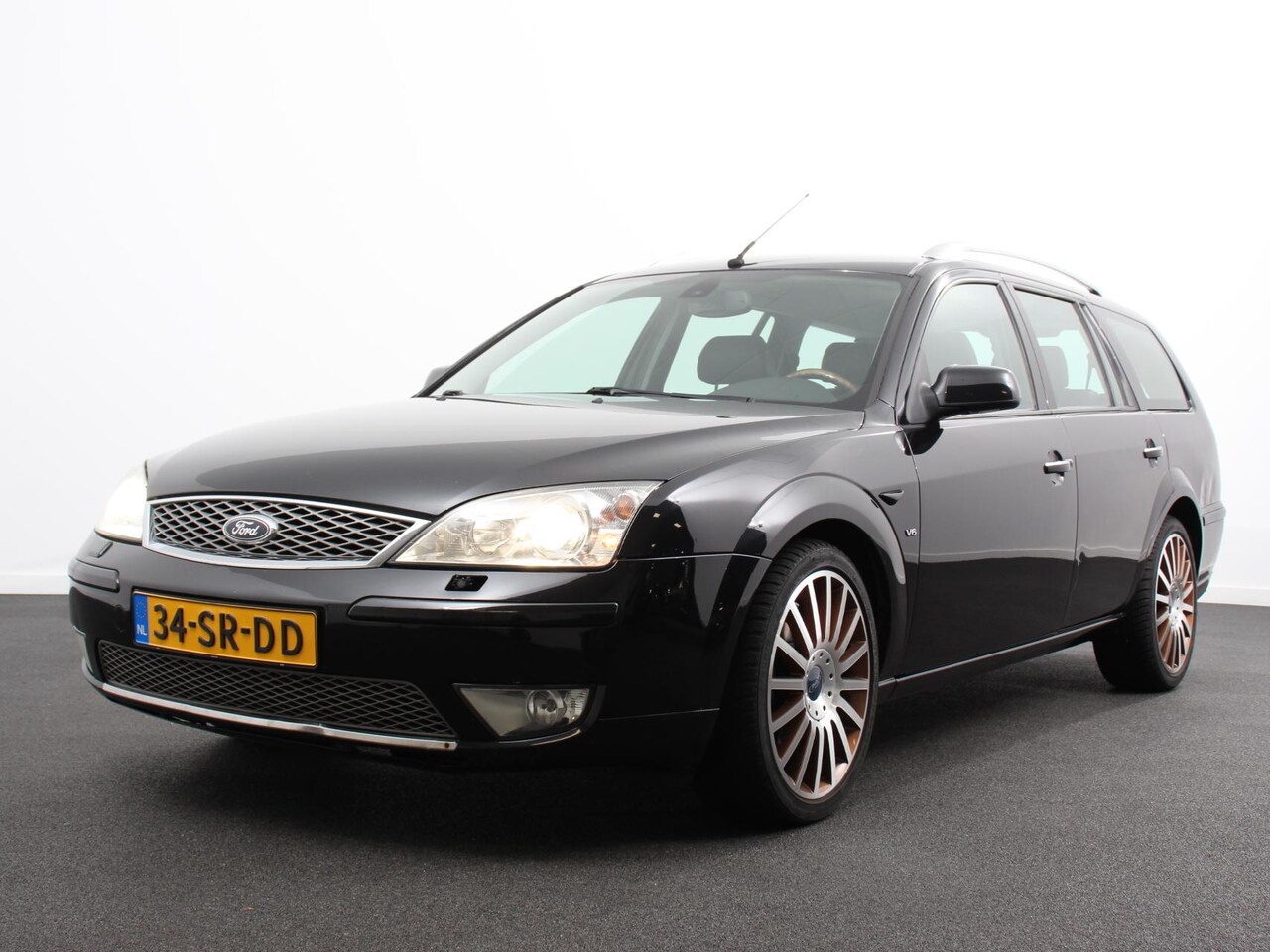 Ford Mondeo Wagon - 2.5 V6 Ghia Executive Handel/Export ! Half Leder Trekhaak Navigatie Climate Control Tr - AutoWereld.nl