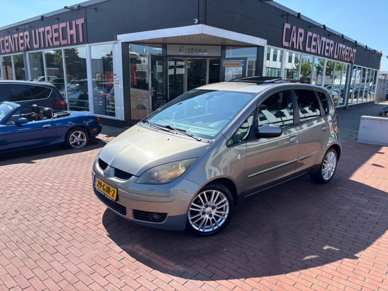 Mitsubishi Colt - 1.5 Sky 5drs airco dubb pano nette colt - AutoWereld.nl