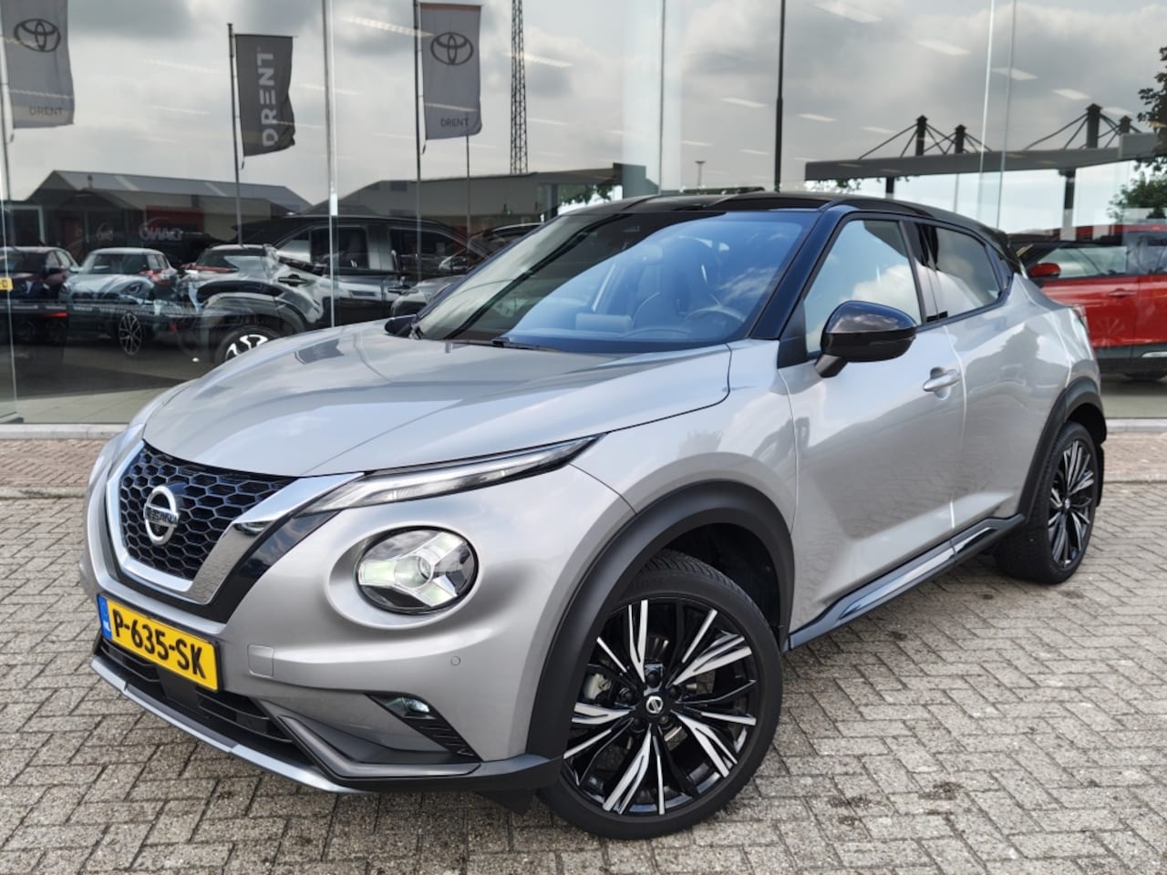 Nissan Juke - 1.0 DIG-T N-Design | BOSE | Navi | Leder | 360 Camera | Sensoren v/a - AutoWereld.nl
