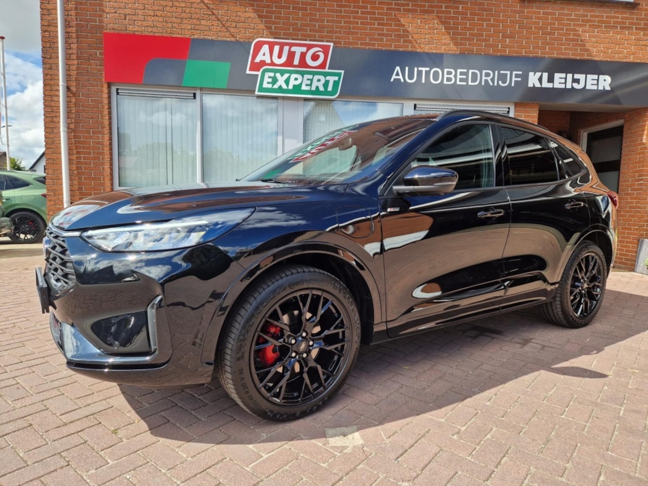 Ford Kuga - 2.5 PHEV 243pk e-CVT ST-Line X Black Pack 20" - AutoWereld.nl