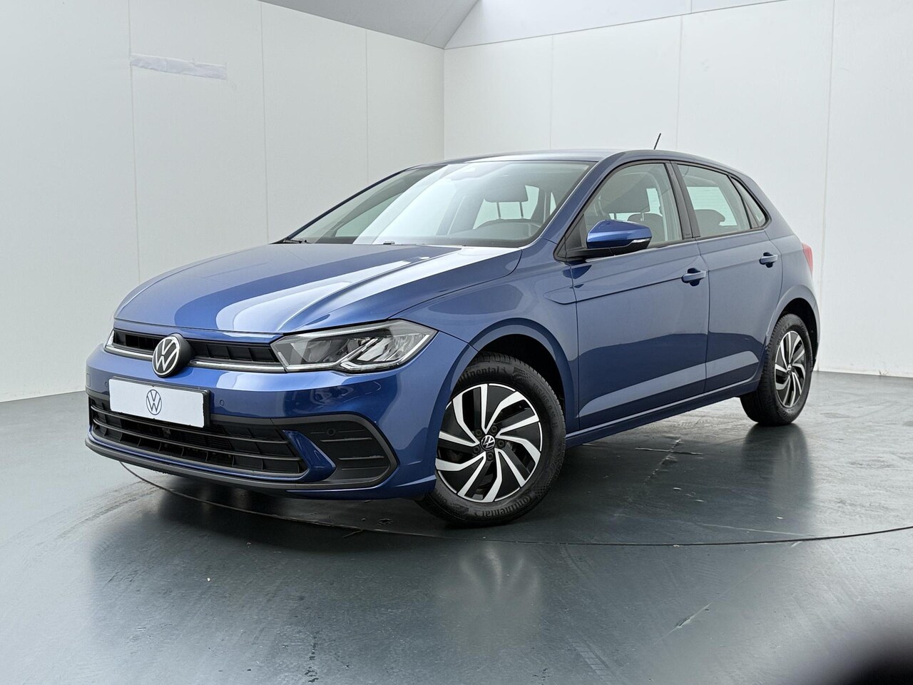 Volkswagen Polo - 1.0 TSI Go | 95 PK | Adaptive Cruise Control | LED verlichting | Travel Assist | Parkeerse - AutoWereld.nl