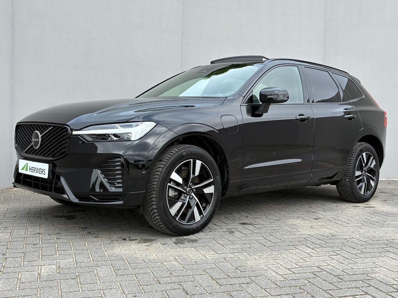 Volvo XC60 - 2.0 T8 Plug-in hybrid AWD Ultra Bright / 12-2025 / Facelift / Schuif-/Kantel dak / All-Sea - AutoWereld.nl