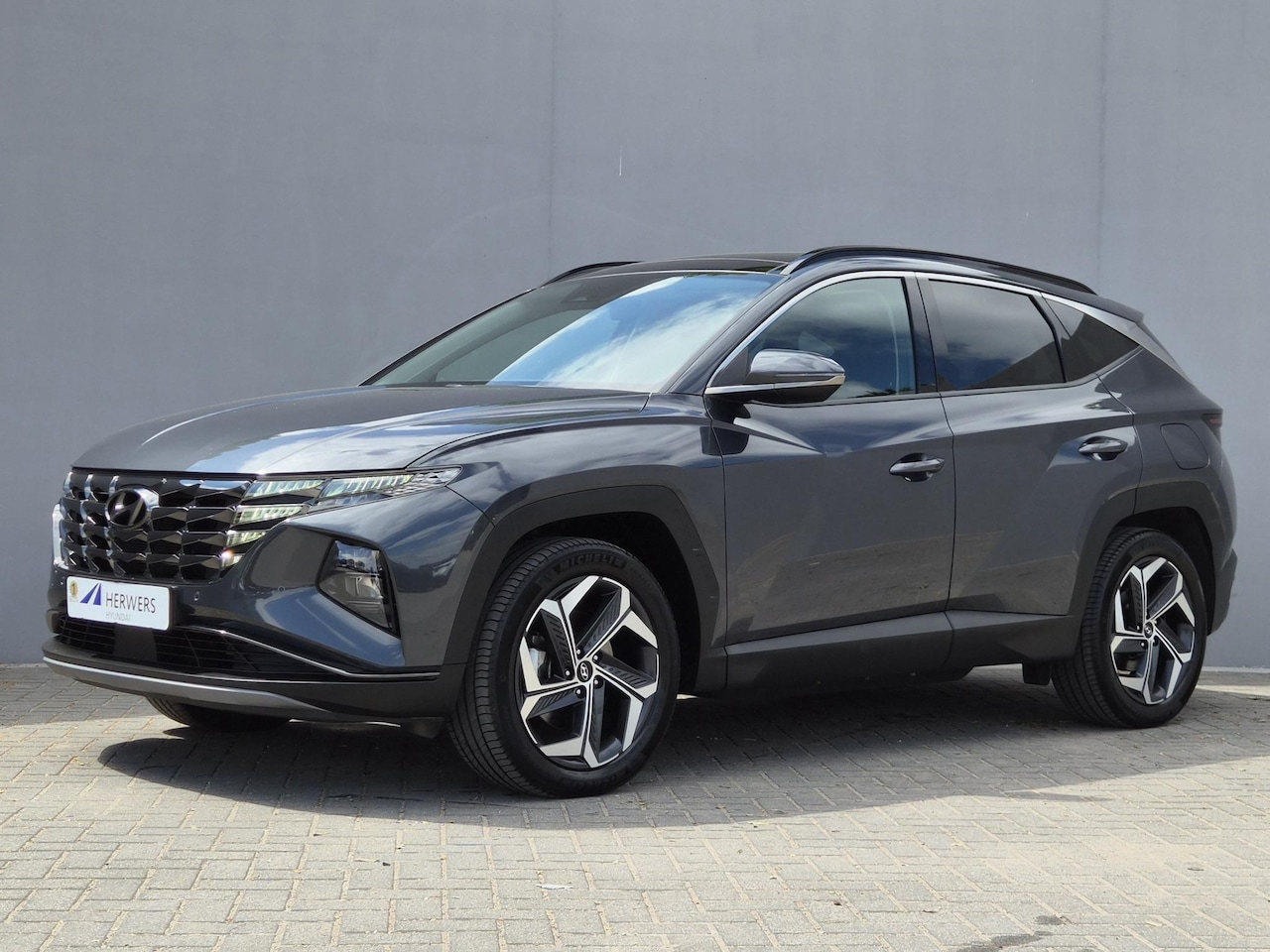 Hyundai Tucson - 1.6 T-GDI PHEV Comfort Smart 4WD / Fabrieksgarantie tot 02-2029 / Dealer onderhouden / Gla - AutoWereld.nl