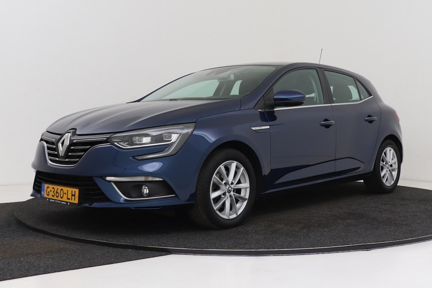 Renault Mégane - 1.2 TCe Limited | Trekhaak | Automaat | CarPlay | Leer | Stoelverwarming | Massage | Head- - AutoWereld.nl