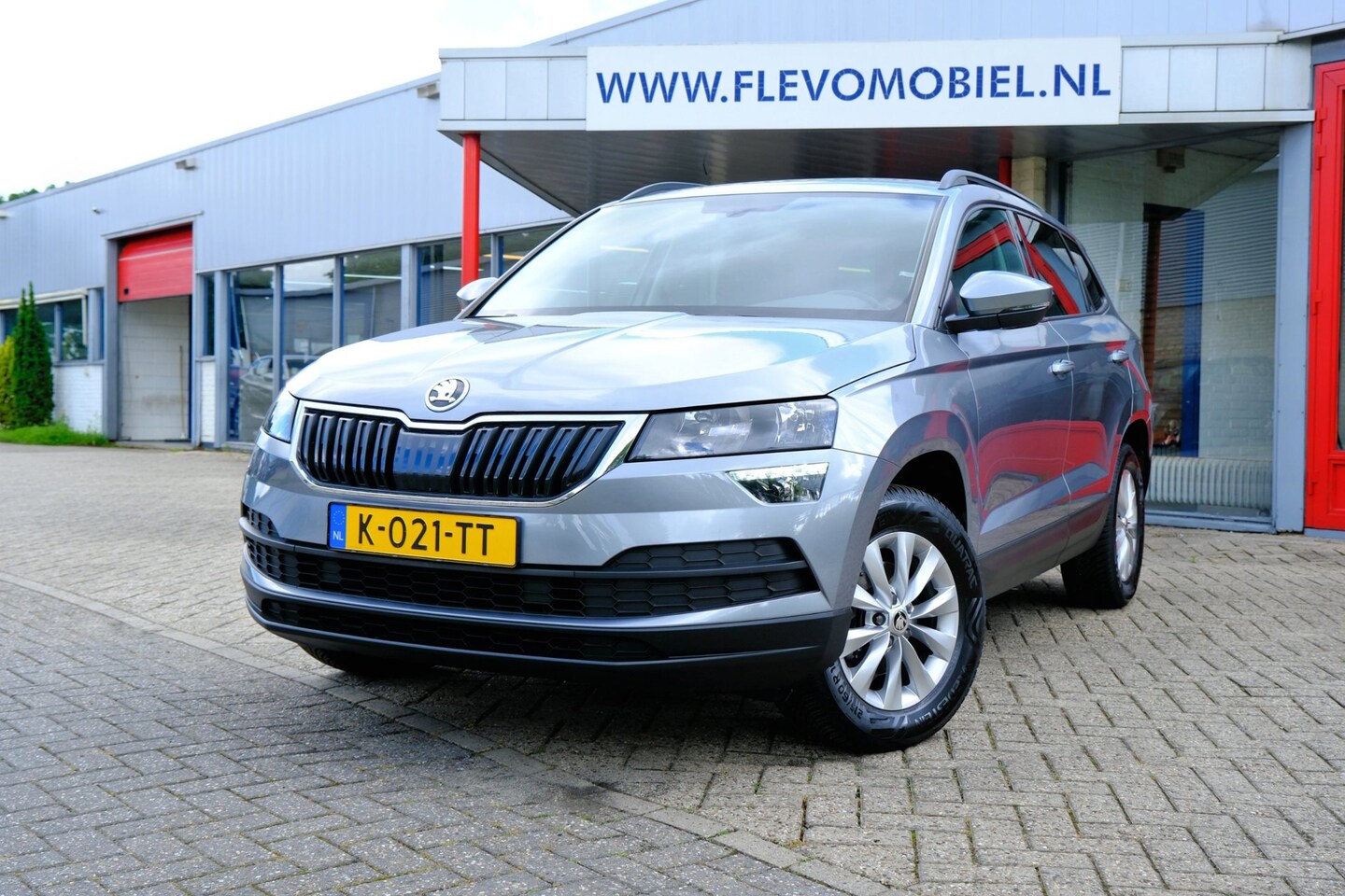 Skoda Karoq - 1.0 TSI Business Edition Navi|Adapt.Cruise|1e Eig|CarPlay|Clima|LMV - AutoWereld.nl