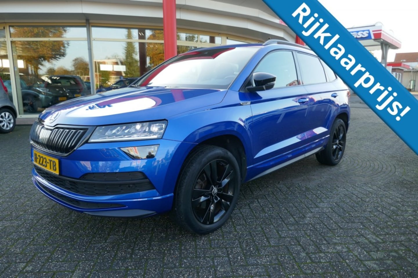 Skoda Karoq - 1.5 TSI SPORTL. BUS.  150 PK PANODAK/CAMERA/TREKHAAK/VIRTUAL - AutoWereld.nl
