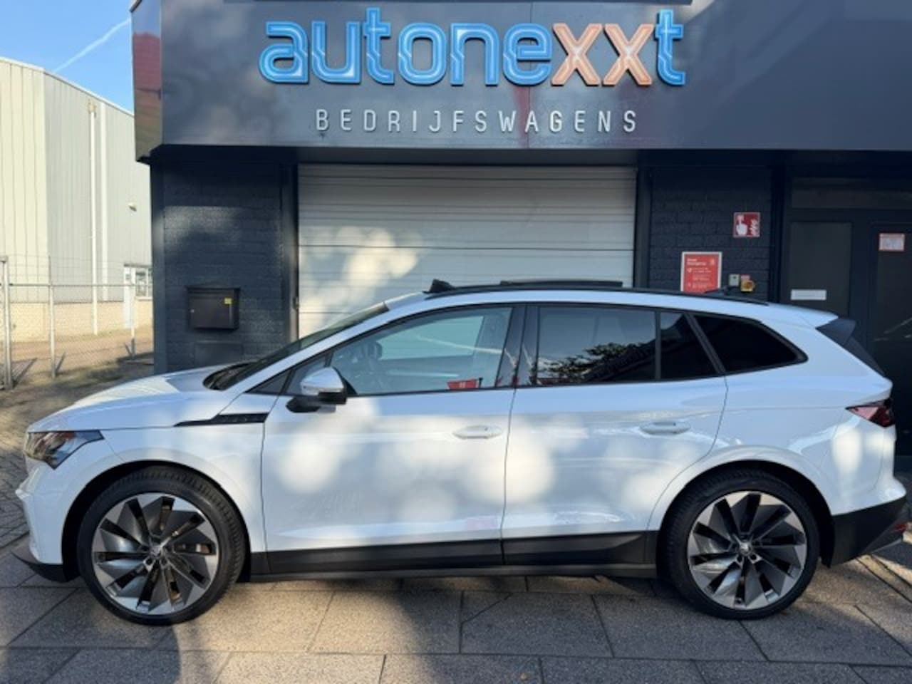 Skoda Enyaq iV - 60 Sportline INCL 12 MAANDEN UITGEBREIDE GARANTIE AIRCO I NAV I PDC I CAMERA I SOH 91.5% I - AutoWereld.nl