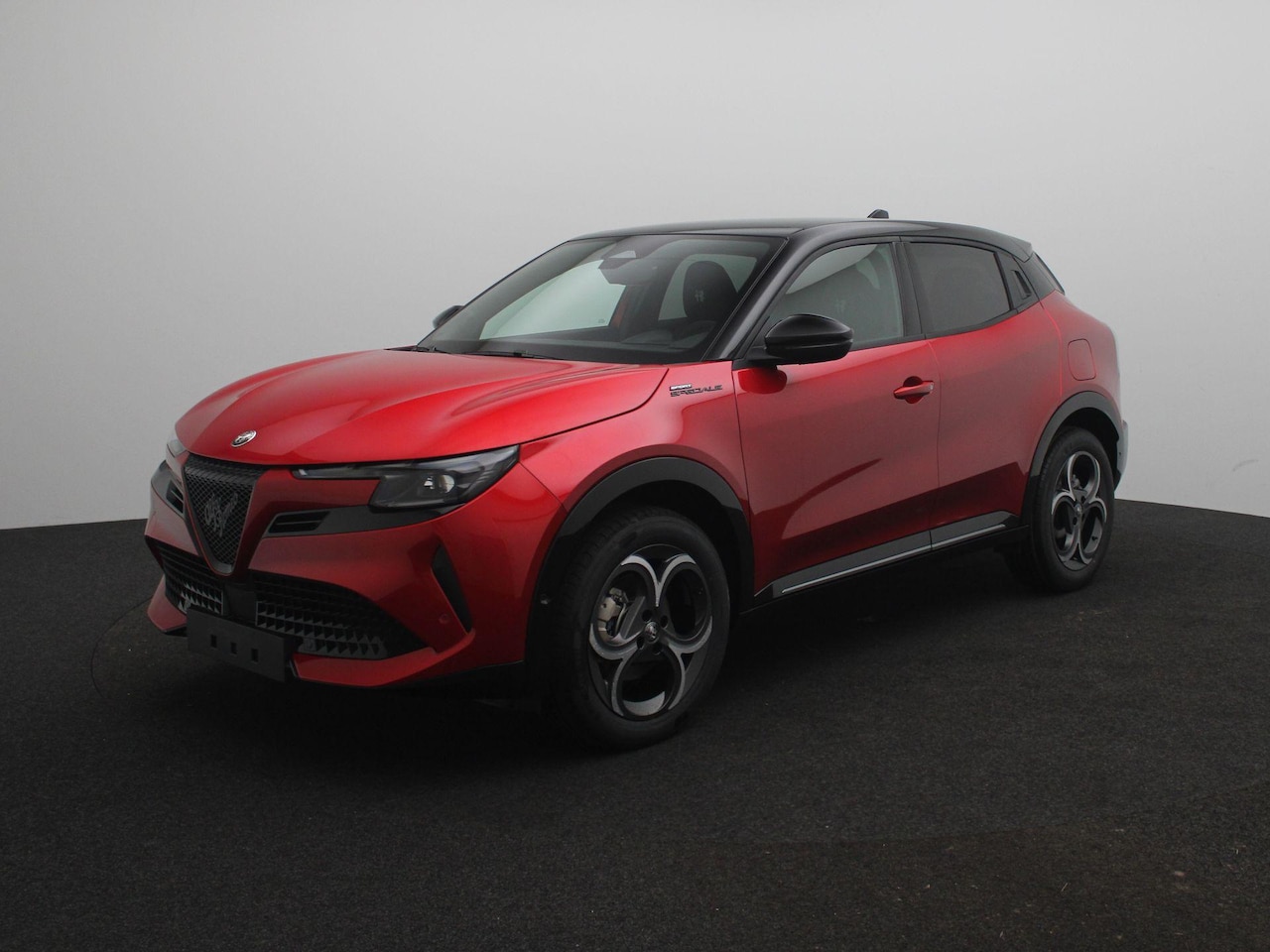 Alfa Romeo Junior - 1.2 Turbo Hybrid Ibrida Sport Speciale | Elektr. Panoramadak | Techno Pack | Tot 8 jaar ga - AutoWereld.nl