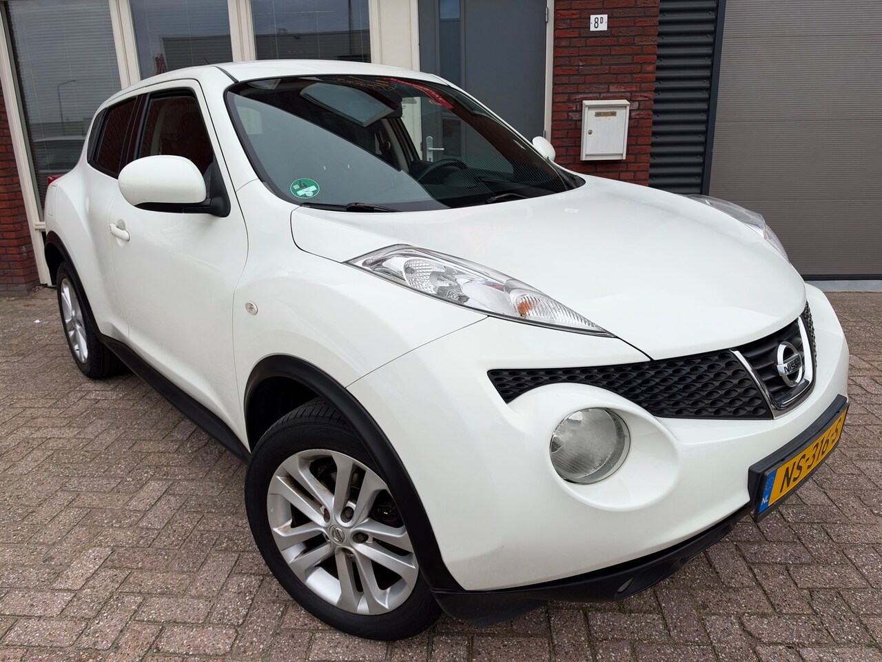 Nissan Juke - 1.6 Tekna / AUT / Navi / Camera / Clima / Stoelverw / Keyless / LM - AutoWereld.nl