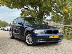 BMW 1-serie - 118i Business Line | Navi + Cruise + Clima Nu € 3.975,