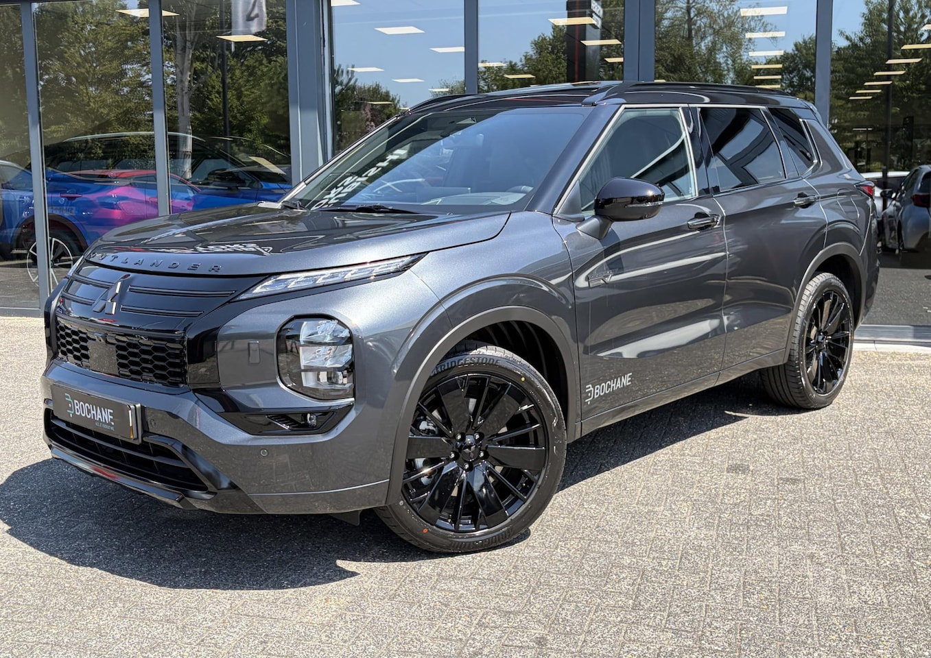 Mitsubishi Outlander - 2.4 PHEV Black Edition | DEMO | All Black trim | Zeer complete uitvoering | Actieprijs | - AutoWereld.nl